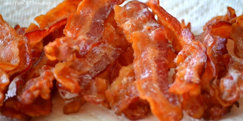 baked bacon on a paper towel