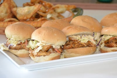 chicken sliders with coleslaw on white tray