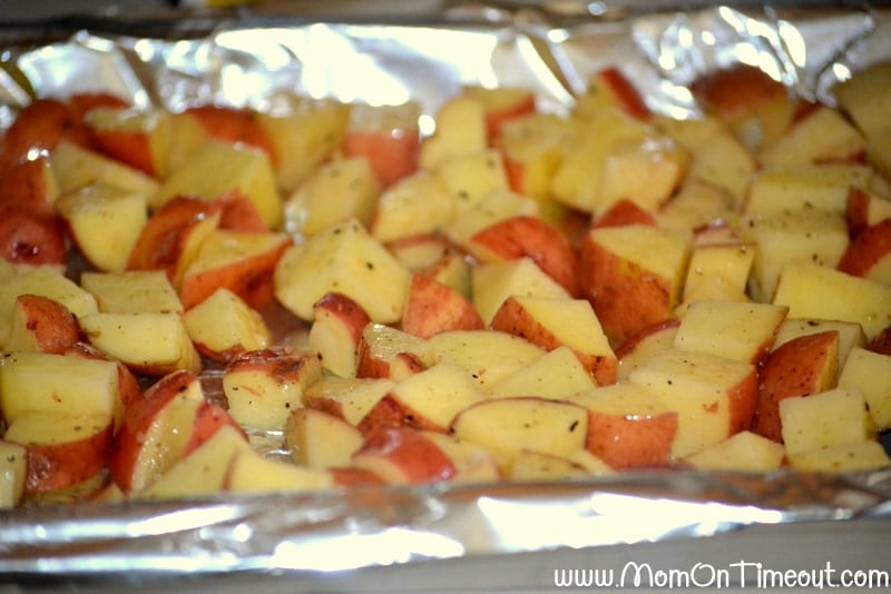 Roasted red potatoes on a foil lined baking sheet