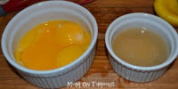 eggs separated into two white bowls