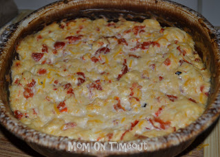 This wonderfully cheesy Roasted Red Pepper Dip is a guaranteed crowd-pleaser! | MomOnTimeout.com