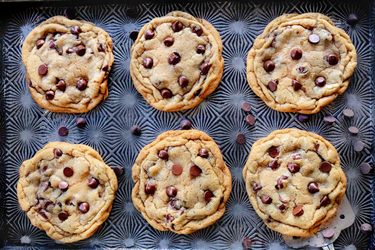 6 cookies baked on antique baking sheet