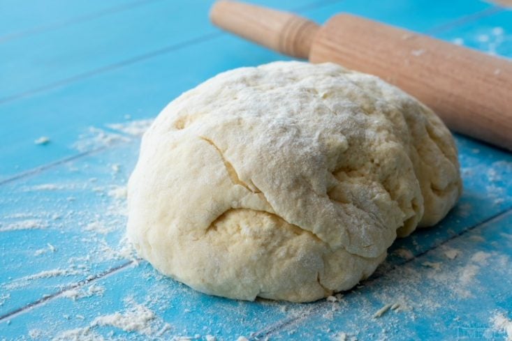 biscuit dough with rolling pin