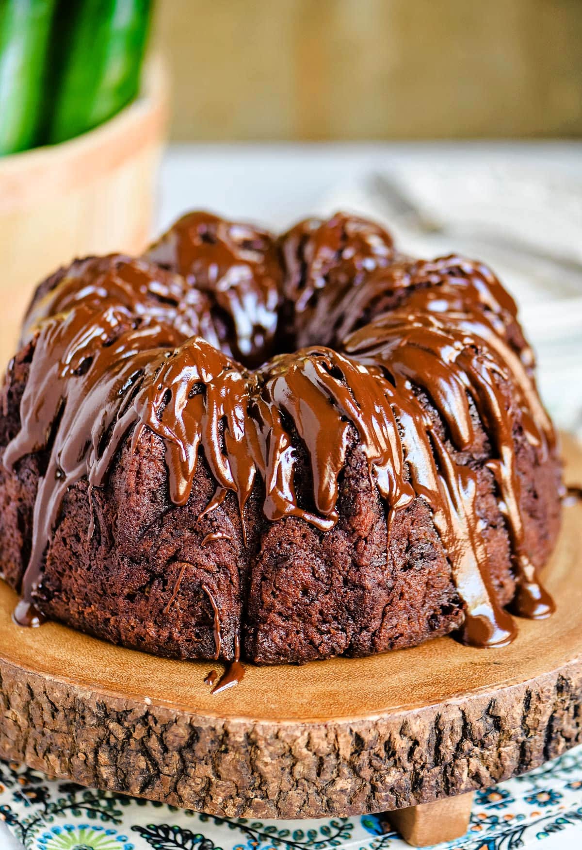beautiful shiny chocolate glaze on top of a bundt cake.