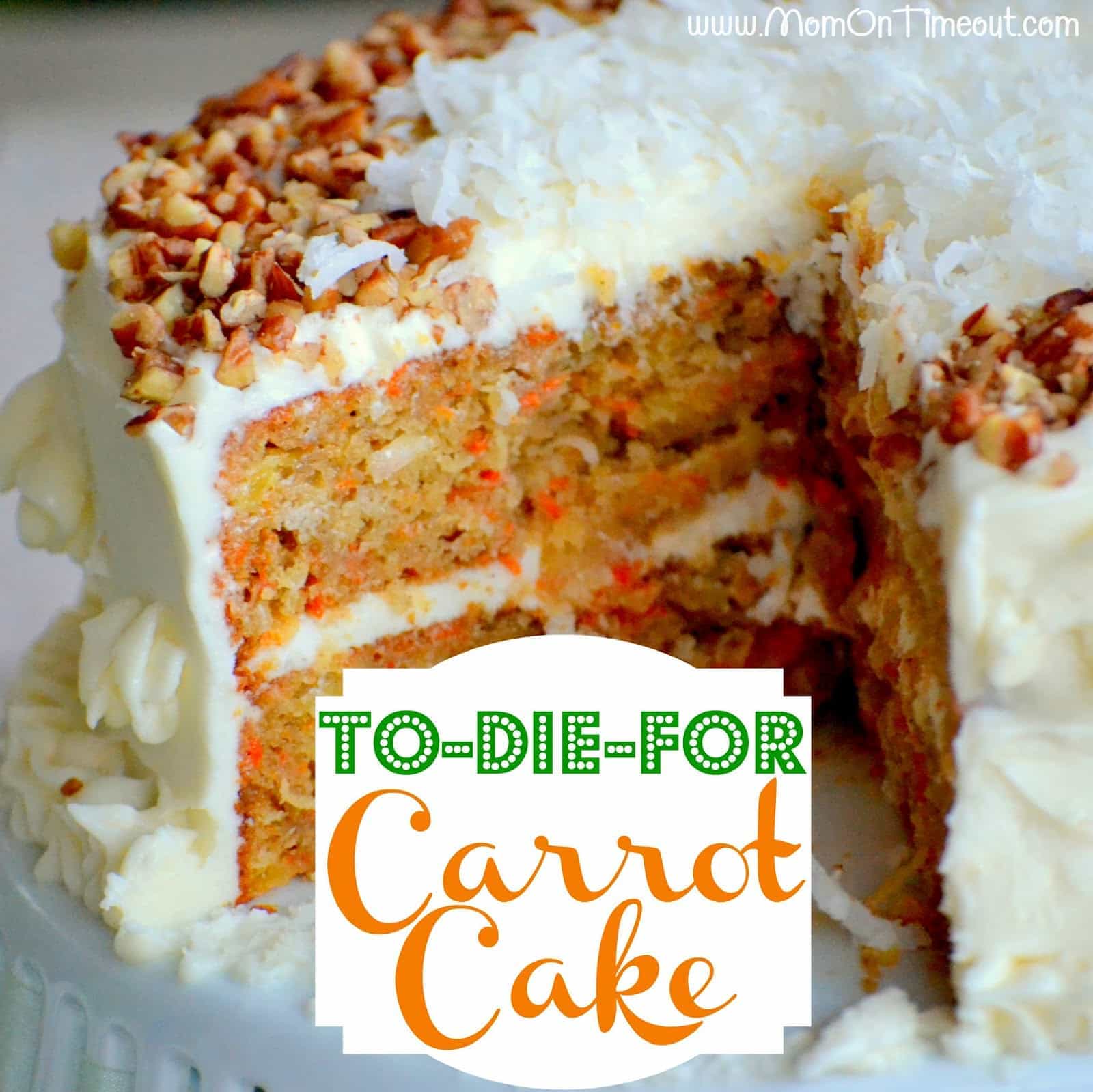 Carrot Cake on a white cake stand with a slice removed