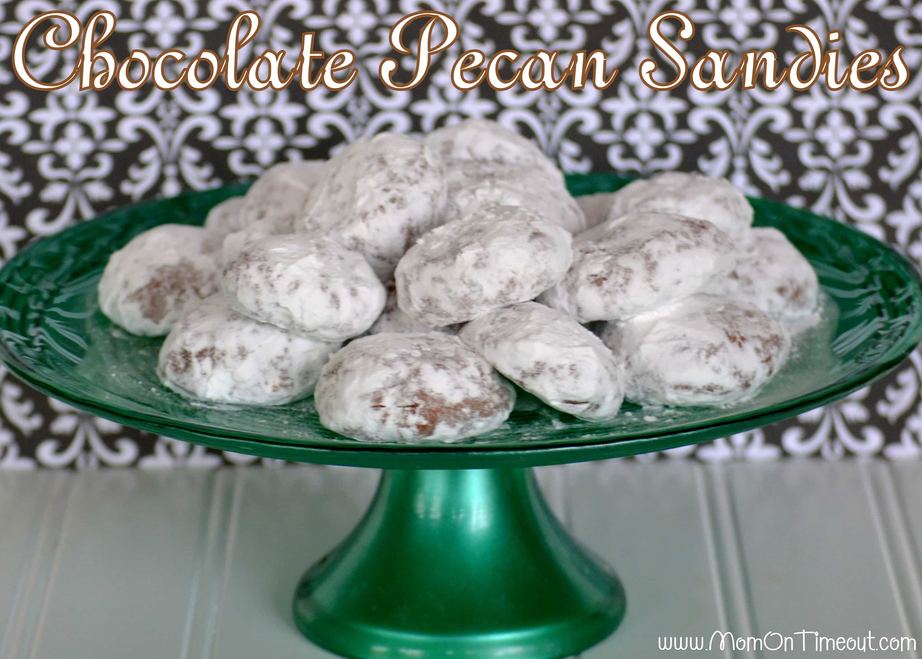 Chocolate Pecan Sandies | Mom On Timeout - Snowy white on the outside and chocolaty on the inside – a yummy twist on the original! #cookies #recipes #desserts