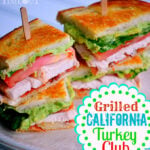 turkey club sandwich with avocado and bacon on small lunch plate