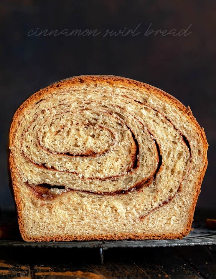 cinnamon bread recipe on rack slice cut