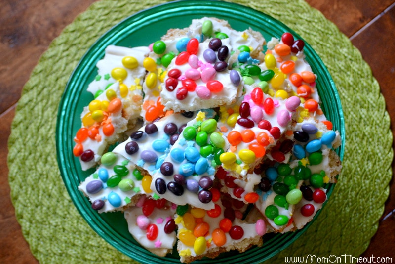 top down of rainbow cookie bark on cake plate