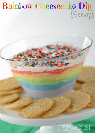 Rainbow recipes like these rainbow cheesecake dip with purple, blue, green, yellow, orange, red, white cheesecake with sprinkles and cinnamon cookies