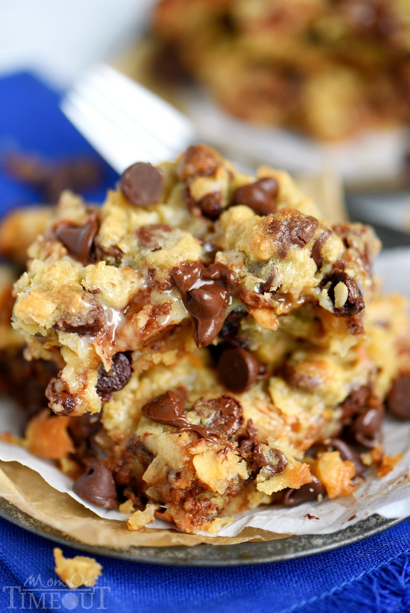 Coconut Toffee Chocolate Chip Cookie Bars are impossible to resist with their ooey, gooey center and incredible flavor! Great for parties and potlucks! // Mom On Timeout