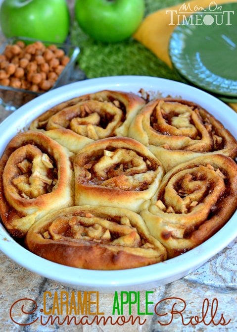 Craving caramel apples? Try these Caramel Apple Cinnamon Rolls for a sweetly satisfying breakfast treat! These gorgeous rolls are topped with a mouth-watering caramel icing and filled with Granny Smith apples and caramel. | MomOnTimeout.com