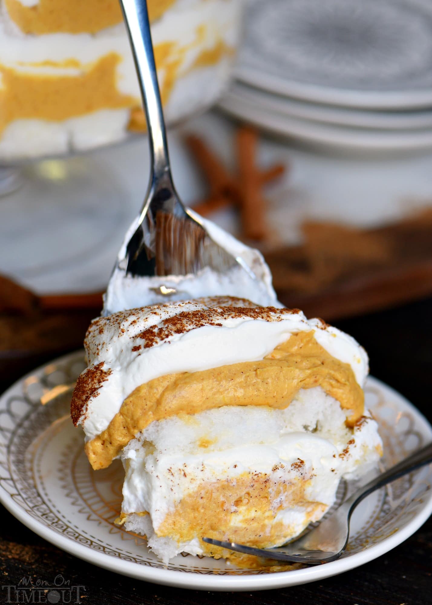  This Pumpkin Cheesecake Trifle is sure to impress all season long! Layers of pumpkin cheesecake, whipped cream and angel food cake combine for a fall treat that's impossible to resist! Gorgeous, simple, and totally delicious! // Mom On Timeout