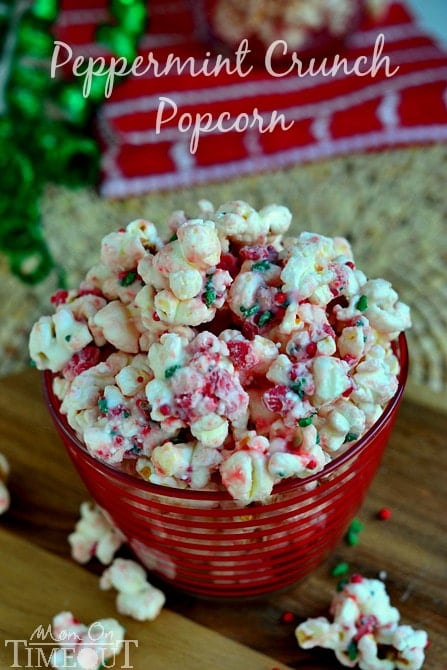 You're going to love the fabulous flavor and satisfying crunchy sweetness of this Peppermint Crunch Popcorn! It takes just minutes to prepare and would make the perfect gift this holiday season! Take this to your holiday party and let the compliments roll in! | MomOnTimeout.com | #popcorn #Christmas #recipe
