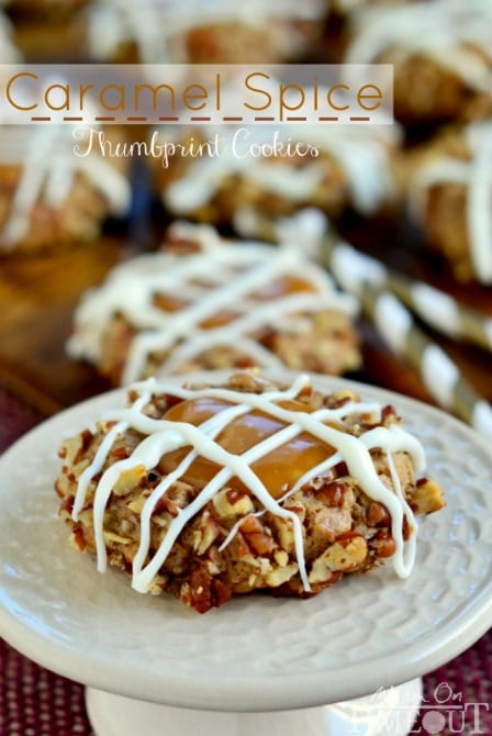 These Caramel Spice Thumbprint Cookies start with a spice cake mix and end with a white chocolate drizzle - cookie perfection! | MomOnTimeout.com