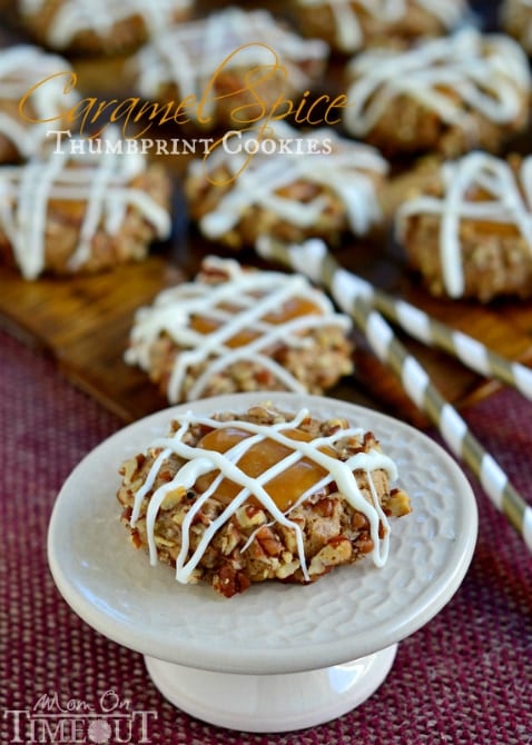 These Caramel Spice Thumbprint Cookies start with a spice cake mix and end with a white chocolate drizzle - cookie perfection! | MomOnTimeout.com