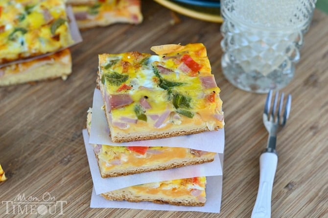 Ham and Cheese Breakfast Bars are loaded with veggies, ham and cheese and baked on a crescent roll crust! Serve with a cold glass of milk for the perfect breakfast or brunch! | MomOnTimeout.com #sponsored