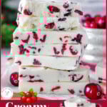 Two image graphic showing white chocolate cranberry fudge stacked high, creamy white and studded with dried cranberries. Text overlay at top and bottom of image.