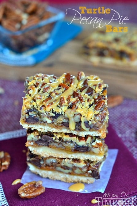 If you love pecan pie you're going to go crazy for these Turtle Pecan Pie Bars! Packed full of crunchy pecans, creamy caramel, and decadent chocolate, these bars are sure to satisfy your sweet tooth! | MomOnTimeout.com #sponsor #pie #turtle