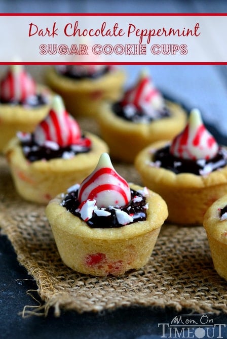 Dark Chocolate Peppermint Sugar Cookie Cups filled with chocolate ganache and topped with Candy Cane Hershey's Kisses. | MomOnTimeout.com #christmas #recipe