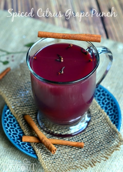 This Hot Spiced Citrus Grape Punch is the perfect beverage to serve up at your holiday celebrations! | MomOnTimeout.com #beverage #punch #recipe