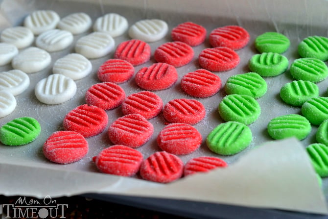 You're going to love this Easy Christmas Peppermint Patties recipe! Super easy to make, fantastically festive, and always a hit with kids and adults alike. These holiday treats are the perfect addition to cookie trays and make an excellent gift for teachers and friends! | MomOnTimeout.com #Christmas #candy #recipe