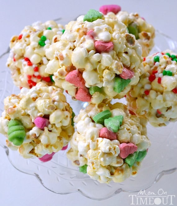 Popcorn Balls | SimplyCelebrate.Meals.com - Wonka candies bring the Christmas spirit to these treats. Wrap up these yummy popcorn balls for cute gifts! #christmas #simplycelebrate