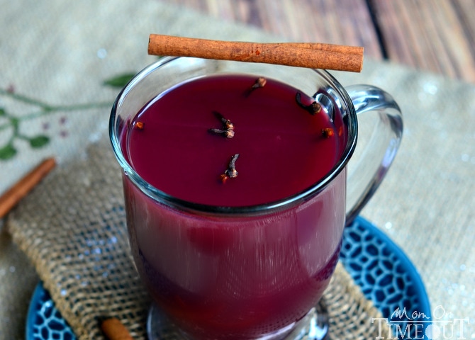 This Hot Spiced Citrus Grape Punch is the perfect beverage to serve up at your holiday celebrations! | MomOnTimeout.com #beverage #punch #recipe