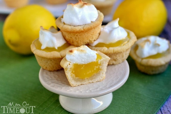 Sugar cookie cups pair perfectly with the refreshingly tart lemon curd filling in these Lemon Meringue Cookie Cups! MomOnTimeout.com