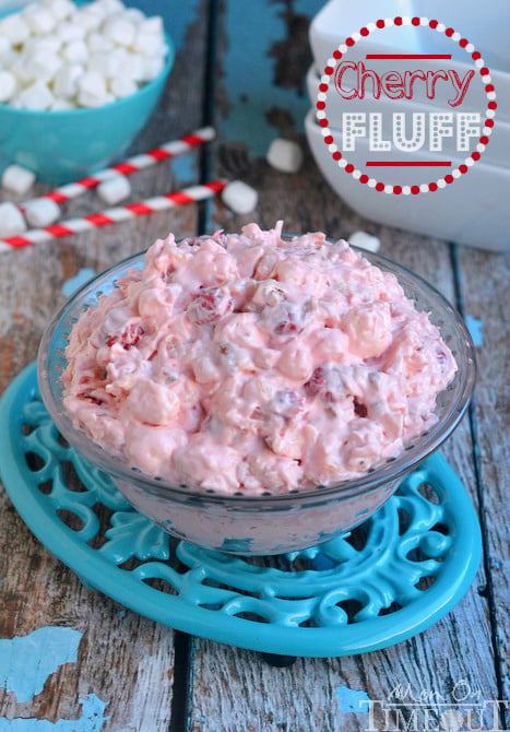 easy cherry fluff dessert salad in clear bowl on blue trivet with title overlay