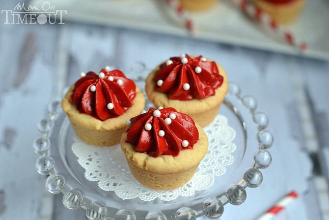 These Red Velvet Cheesecake Cookie Cups take just minutes to prepare and are so fabulously festive! | MomOnTimeout.com