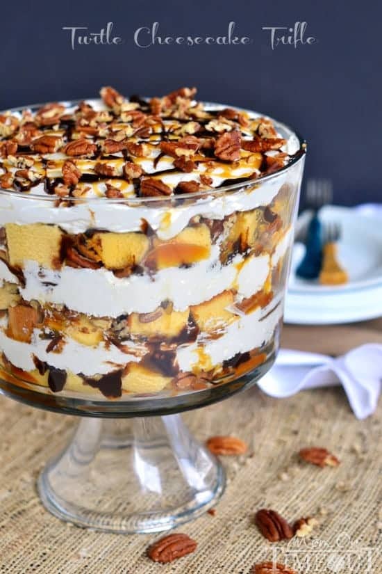 Turtle Cheesecake Trifle - Layers of caramel, chocolate, pecans, no bake cheesecake, and pound cake! | MomOnTime.com #PoundCakeDay