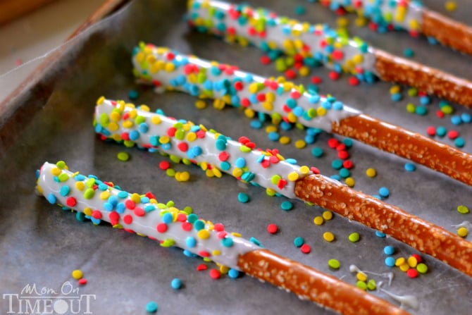 Easy Rainbow Pretzel Wands take just minutes to make and are perfectly scrumptious! | MomOnTimeout.com
