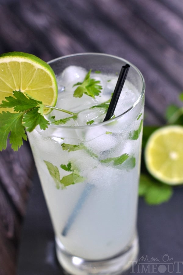 This Coconut Lime Cilantro Cooler is the perfect cocktail for summer! | MomOnTimeout.com