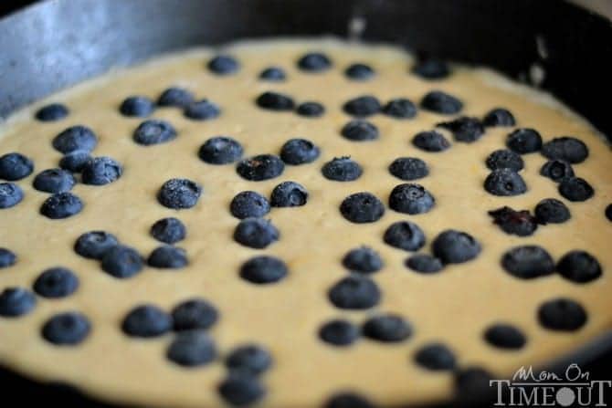 Oven-Baked Blueberry Skillet Pancake with orange zest and cinnamon. No more standing and flipping pancakes on Sunday morning! | MomOnTimeout.com