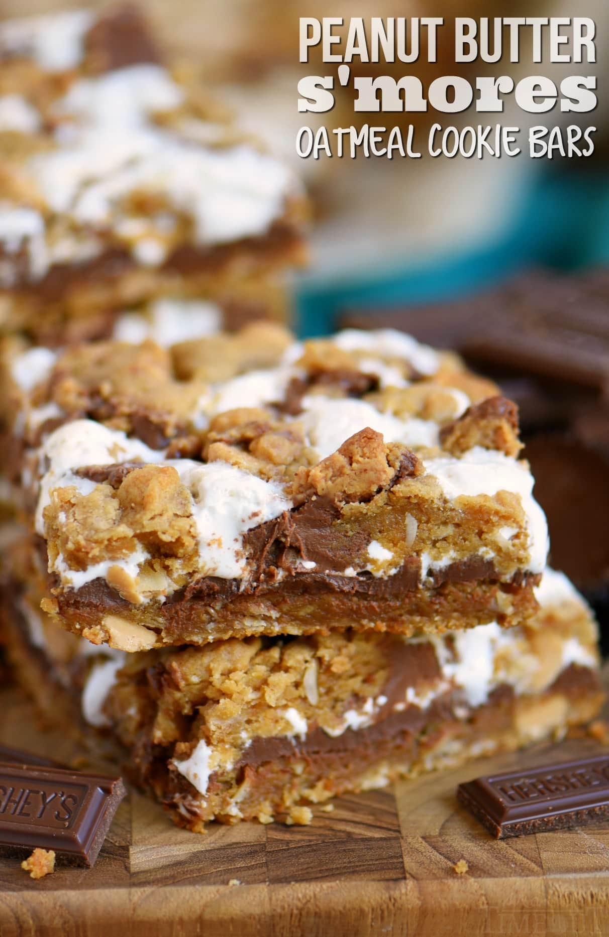 Reese's Peanut Butter S'mores Oatmeal Cookie Bars because you don't need an open flame to enjoy the ultimate s'mores treat! Ooey gooey peanut butter and chocolate perfection in a convenient s'mores cookie bar package. You're gonna love 'em! // Mom On Timeout #smores #chocolate #peanutbutter #reeses #candy #bars #recipe #oatmeal #cookie #cookies #dessert #desserts #baking peanut-butter-smores-oatmeal-cookie-bars-recipe-title