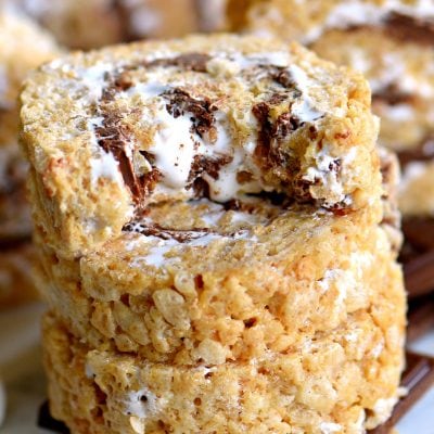 [adthrive-in-post-video-player video-id="i2r3DDij" upload-date="2019-06-19T21:16:14.000Z" name="S'mores Rice Krispies Treats Pinwheels" description="Say goodbye to boring squares and hello to these fun S’mores Rice Krispies Treats Pinwheels! Layers of marshmallow, chocolate, and graham cracker rice krispies treats are rolled up into the perfect bite-size package! Irresistible!"]
