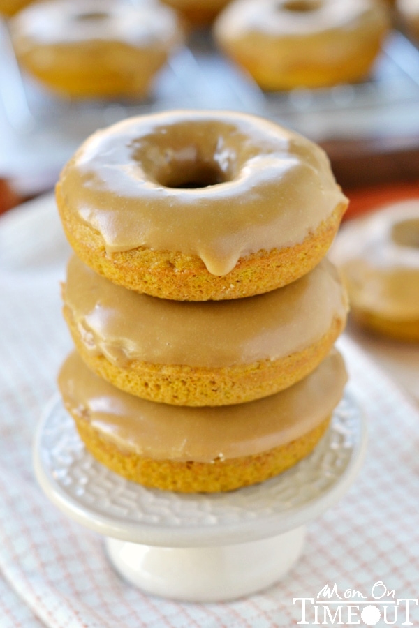 These easy Baked Pumpkin Spice Donuts with Maple Glaze are perfectly moist and bursting with flavor - the quintessential fall breakfast! | MomOnTimeout.com | #pumpkin #donut #doughnut #breakfast #recipe #IDelight