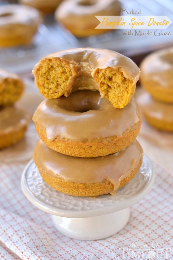 These easy Baked Pumpkin Spice Donuts with Maple Glaze are perfectly moist and bursting with flavor - the quintessential fall breakfast! | MomOnTimeout.com | #pumpkin #donut #doughnut #breakfast #recipe #IDelight