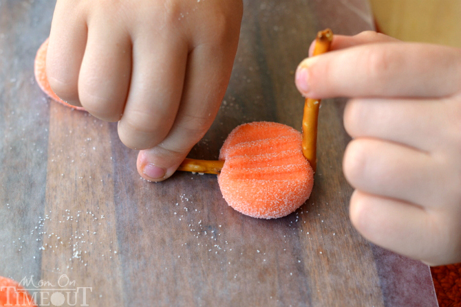 Delightfully easy Pumpkin Patties are the perfect no-bake treat to celebrate the season with. The cute factor here is off the charts! | MomOnTimeout.com | #recipe #pumpkin #candy #halloween #Thanksgiving