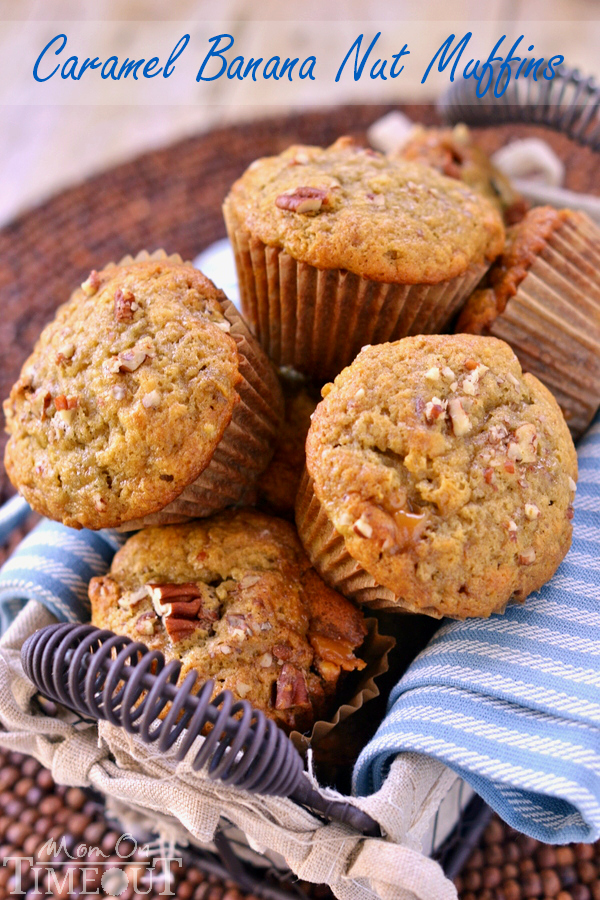 lots of banana nut muffins in basket with blue and white striped towel