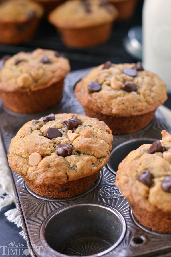 Incredibly moist and delicious Peanut Butter Banana Chocolate Chip Muffins packed with peanut butter flavor and sweet morsels of chocolate. For mornings when you just need a little chocolate. | MomOnTimeout.com | #recipe #breakfast