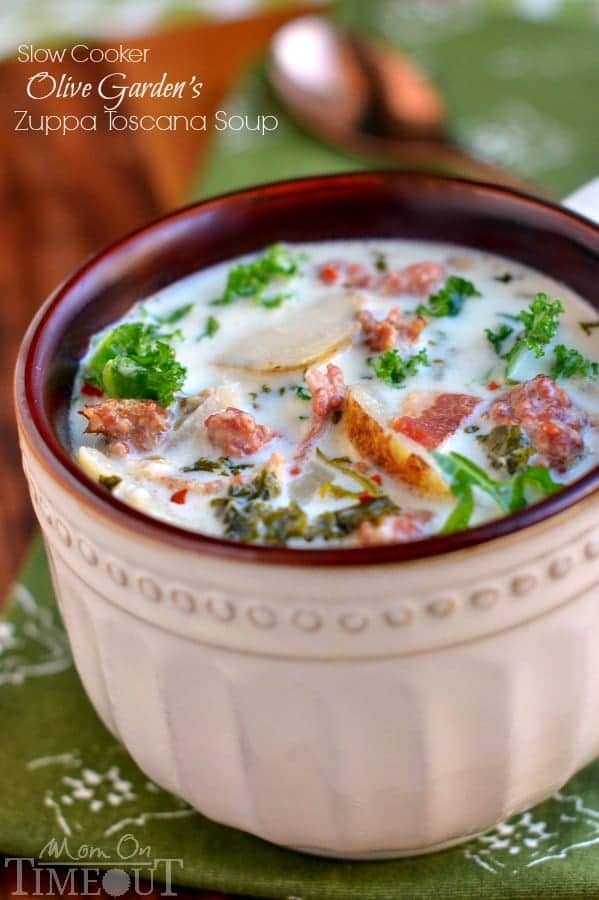 Get ready to please the whole family with this copycat Slow Cooker Olive Garden's Zuppa Toscana Soup! Comfort food at it's best! | MomOnTimeout.com | #recipe #soup #copycat #dinner