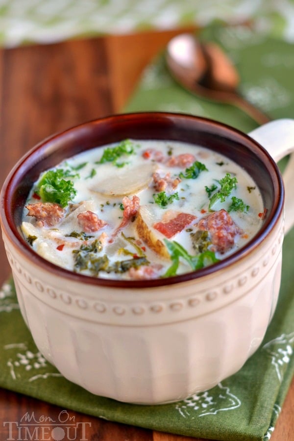 Get ready to please the whole family with this copycat Slow Cooker Olive Garden's Zuppa Toscana Soup! Comfort food at it's best! | MomOnTimeout.com | #recipe #soup #copycat #dinner