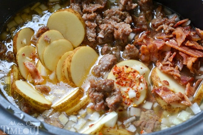 Get ready to please the whole family with this copycat Slow Cooker Olive Garden's Zuppa Toscana Soup! Comfort food at it's best! | MomOnTimeout.com | #recipe #soup #copycat #dinner