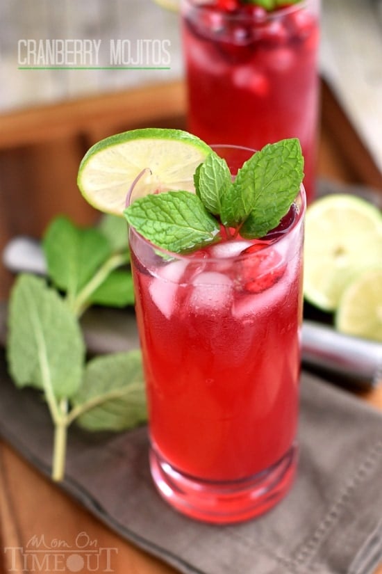 Cranberry Mojitos are perfect for any night but especially a celebration! Tart, sweet, refreshing, and delicious - everything a good cocktail should be. | MomOnTimeout.com | #cocktail #cranberry #beverage #recipe