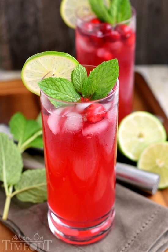 Cranberry Mojitos are perfect for any night but especially a celebration! Tart, sweet, refreshing, and delicious - everything a good cocktail should be. | MomOnTimeout.com | #cocktail #cranberry #beverage #recipe