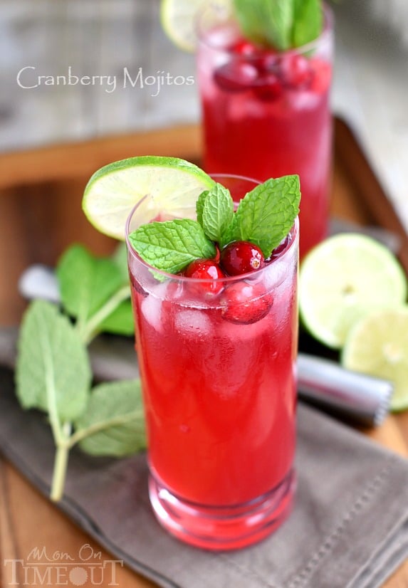 Cranberry Mojitos are perfect for any night but especially a celebration! Tart, sweet, refreshing, and delicious - everything a good cocktail should be. | MomOnTimeout.com | #cocktail #cranberry #beverage #recipe