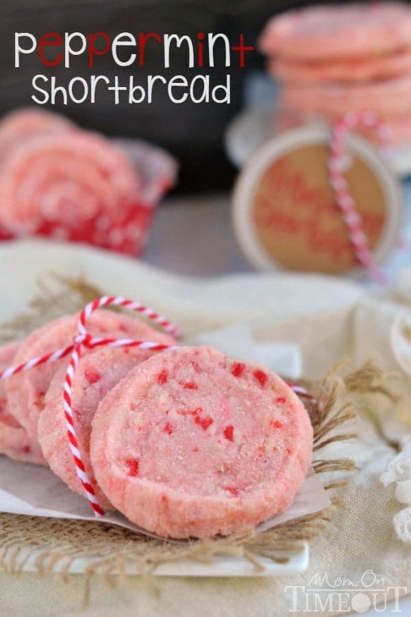 peppermint shortbread cookies with red and white twine laid on parchment with title overlay at top of image