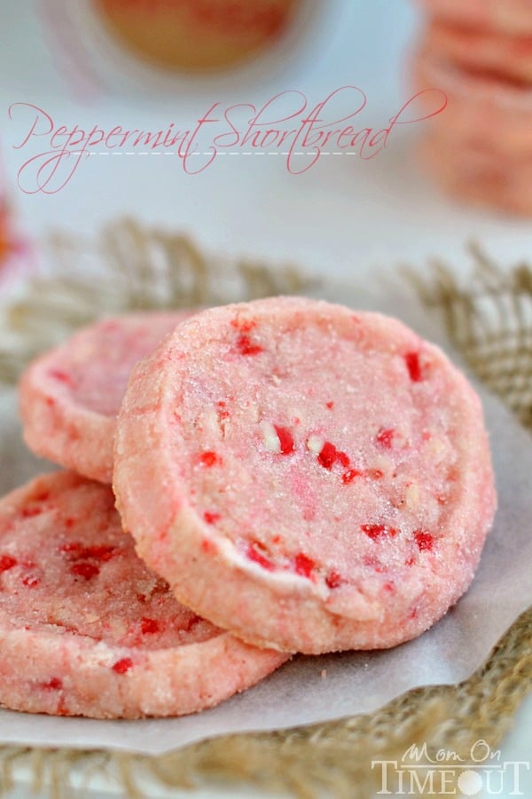 These festive Peppermint Shortbread Cookies are the perfect addition to your holiday cookie trays this year! With only five ingredients, they are quick and easy to make and look so gosh darn pretty! | MomOnTimeout.com | #recipe #cookie #WishForOthers